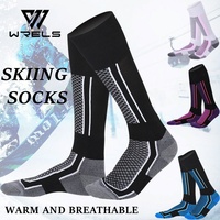 WRELS Chaussettes de ski unisexes à fond épais en tissu éponge, chaussettes de ski chaudes pour l'hiver, chaussettes longues pour la randonnée en plein air, chaussettes à séchage rapide résistantes au froid