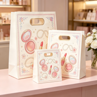 Sacs en papier personnalisés avec poignée creuse, emballage de vente au détail écologique, parfaits pour transporter le maquillage et les cosmétiques