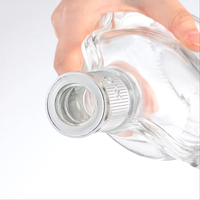 Botol Kaca Silinder Mewah untuk Whisky/Anggur 750ml/700ml dengan Tutup Gabus Permukaan Dapat Disesuaikan Melalui Sablon