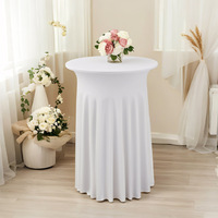 Jupe de table ronde en spandex blanc, élastique et ajustée, pour table haute, idéale pour la décoration de mariages, banquets et événements.