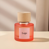 Flacon de parfum en verre personnalisé de 30 ml, 50 ml, 100 ml, cylindrique, bleu, rouge, vert, avec pulvérisateur à pompe, design givré et bouchon en bois