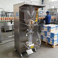 Petite machine automatique de remplissage et d'emballage de liquides à vendre, machine de scellage et de découpe de sachets pour vinaigre, jus, shampoing