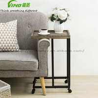 Table console convertible Vino Modern en bois gris et métal noir avec roulettes pour salon et chambre à coucher