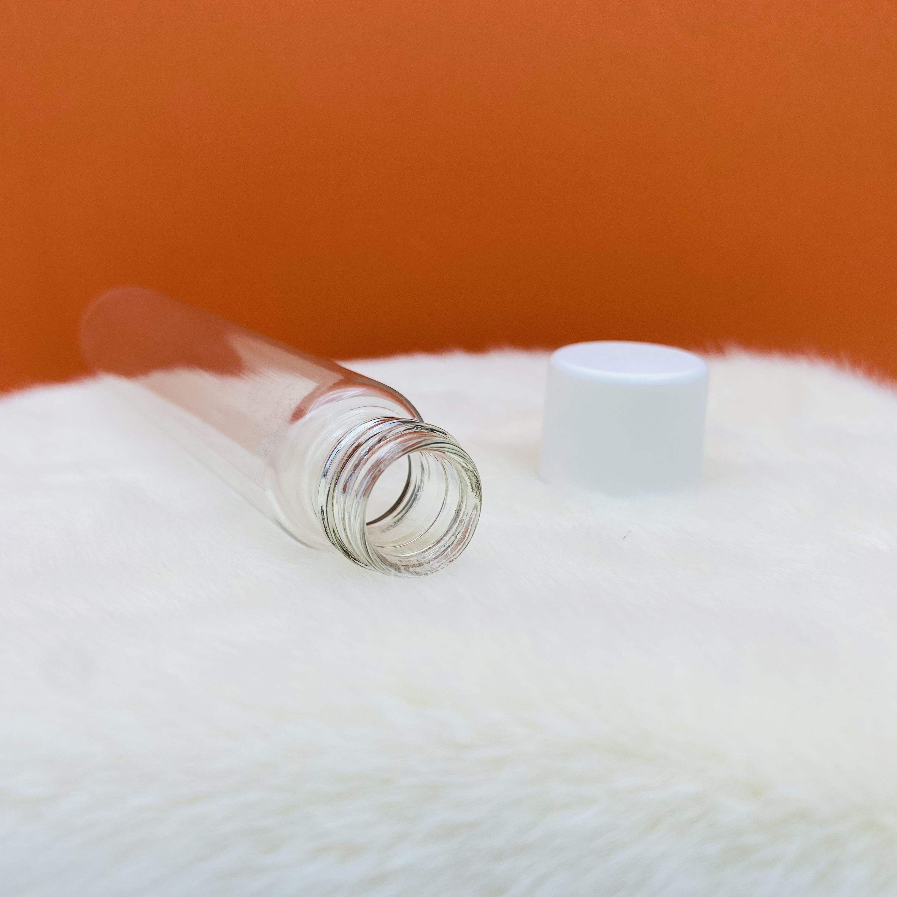 Clear with white cap