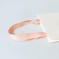Sac cadeau en papier blanc avec logo personnalisé, ruban rose, emballage de luxe pour cosmétiques, bijoux, vêtements, boutique