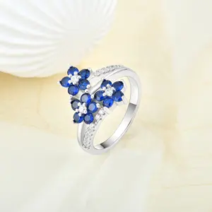 Qingxin Dainty Fine Jewelry Custom OEM Flower Shape 925 Silver Emerald Cut Cubic Zirconia Women Ring