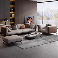 Canapé d'angle moderne en cuir italien, convertible en lit, avec éponge haute densité et base en acier inoxydable de luxe pour la maison et le bureau