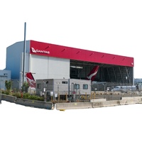 Hangar industriel préfabriqué en structure d'acier, atelier, garage, hangar, système de murs ignifuges, système de portes de grande taille, aviation