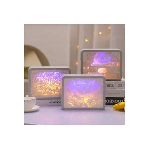Lampe de nuit personnalisée USB à cadre d'art moderne Lampe de sculpture en papier carrée à LED blanc chaud dans le style d'un château en mouvement pour la décoration intérieure de la chambre à coucher - Product Image 2