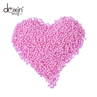 Perles de cire de colophane rose perle rose OEM cire chaude dépilatoire pour l'épilation visage lisse zone de bikini sacs emballés à la noix de coco aloès
