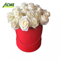 Vente en gros de boîte cadeau de fleurs rondes en carton cylindrique noir de luxe personnalisée pour fleurs avec traitement d'impression de gaufrage