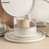 Kitchen Modern Dinning Dishware 16 Pcs Luxury Reactive Glaze White Embossed Stoneware Dishes Plates Ceramic Dinnerware Set for 4