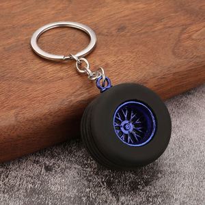 Promotion Porte-clés Pendentif en PVC souple style dessin animé, en forme de pneu de voiture, avec accessoires métalliques artificiels et modèle de moyeu de roue modifié en silicone - Product Image 3