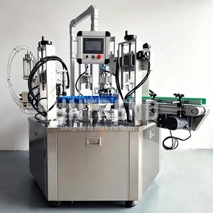 Machine de remplissage et de bouchage rotative multi-têtes sous vide pour liquides parfumés - Product Image 2
