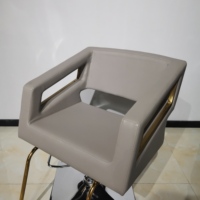 Nouveau produit Chaises de barbier en cuir gris Sulin avec tabouret doré pour salon