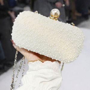 Sac à main bandoulière de soirée au design unique avec des perles de graines de flamant rose, lune et étoile - Product Image 3