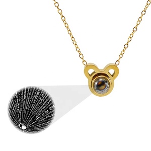 Empañar gratis 18k chapado <span class=keywords><strong>en</strong></span> oro 12 Zodiaco signo Animal colgante <span class=keywords><strong>de</strong></span> acero inoxidable <span class=keywords><strong>de</strong></span> 100 idiomas <span class=keywords><strong>te</strong></span> <span class=keywords><strong>amo</strong></span> proyección collar - Product Image 1