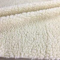 Tissu en fausse fourrure de sherpa en laine, tricotage à la chaîne, longueur du poil de 16 mm, 100 % laine, fond en polyester
