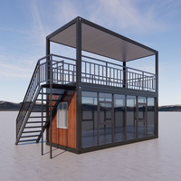 Maison préfabriquée moderne à deux étages avec terrasse et mur-rideau en verre, maison modulaire à faible coût en panneaux sandwich, bureau à domicile en acier, appartement