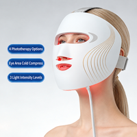 Masque facial LED Photon à usage domestique avec modes de lumière bleue, rose, rouge et orange, 3 niveaux d'intensité, compresse froide pour le contour des yeux et contrôleur filaire