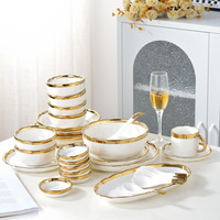 Service de table élégant en céramique plaqué or avec assiettes rondes et ovales pour banquets de mariage et cadeaux de pendaison de crémaillère