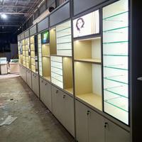 Vitrine de présentation en bois grainé sans peinture pour magasin de lunettes de vue, présentoir optique personnalisé pour détaillant