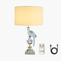 Lámpara de mesa para eventos moderna de lujo Palace, Base de cerámica recargable inalámbrica, Paloma azul, acabado dorado, pantalla blanca, batería