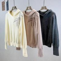 Pull en tricot à capuche à manches longues pour femme avec broderie de chaîne de perles, un pull en laine tricoté ample et tendance