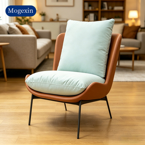 Sillón Moderno con Detalles en Cuero Marrón, Cojín Verde Claro y Patas de Metal para Sala de Estar - Product Image 1