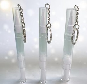 Venta al por mayor de bolígrafos transparentes de 3ml y 5ml para el cuidado personal y la belleza, con esmalte de uñas nutritivo para cutículas y llavero. - Product Image 1