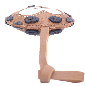 Breloque de sac en cuir en forme de biscuit ludique avec détail de gros yeux - Product Image 4