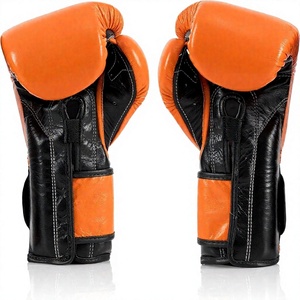 นวมชกมวยไทย Fairtex สีส้ม หนังวัวแท้ สำหรับผู้ใหญ่ แบบรัดสายรัด ปิดนิ้วเต็มรูปแบบ ระบายอากาศได้ดี - Product Image 2