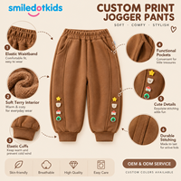 Pantalon de jogging doux en molleton pour enfants, personnalisé OEM ODM, avec applique marron café pour petites filles, avec revers, vente en gros, fabricant d'usine