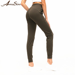 Pantalones de chándal para correr de tela deportiva transpirable para mujer profesional 2023 con bolsillo con cordón de secado rápido para entrenamientos - Product Image 4