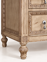 Commode vintage américaine à 6 tiroirs, finition beige, pilastres cannelés, moulures festonnées, poignées en forme de larme