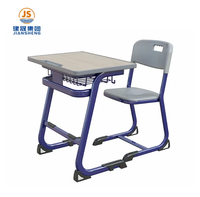 Ensemble de bureau et de chaise d'étudiant moderne, durable et confortable en bois et en plastique avec plateau en MDF et cadre en acier pour le lycée