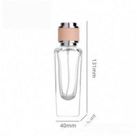 Flacon de parfum de luxe en verre plat vide de 50 ml, atomiseur vintage de haute qualité avec pompe pulvérisatrice et couvercle sérigraphié avec estampage doré