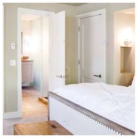 Porte en bois massif de style nordique PRIMA : la choix privilégié pour la rénovation des petits appartements