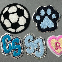 Étiquettes/patchs en caoutchouc PVC personnalisés de haute qualité avec logo 3D en relief pour vêtements