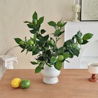 Vente en gros de branches de citron artificielles réalistes et réutilisables, aspect naturel, feuillage de faux citron pour arrangements floraux