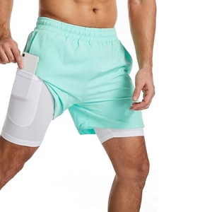 Pantalones Cortos Deportivos de Doble Capa Verde Menta, de Secado Rápido, Elásticos y Transpirables, 2 en 1, para Correr, Gimnasio, Entrenamiento, con Bolsillo Interior para Teléfono, para Adultos y Atletas - Product Image 1