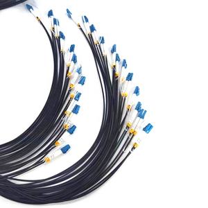 Câble de brassage tactique blindé à <span class=keywords><strong>fibre</strong></span> optique monomode <span class=keywords><strong>OS2</strong></span> G657A1 G657A2 à 12 cœurs et 24 fibres, extrémités décalées LC, avec enrouleur de câble - Product Image 1