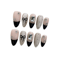 24 faux ongles gothiques faits à la main, forme amande moyenne, avec papillons 3D, étoiles argentées et motifs irréguliers, prêts à poser, style punk noir Y2K