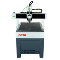 Machine de gravure CNC 3 axes LD-6090 Mini 600x900mm avec moteur de refroidissement par eau 1,5 kW et pompe à engrenages pour la création de motifs et de gabarits en strass