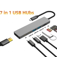 Adaptador Multipuerto 7 en 1 Tipo C con Logotipo Personalizado al por Mayor, Estación de Acoplamiento con TV 4K, PD 100W, USB 2.0, Lector de Tarjetas SD/TF