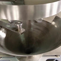 Machine d'emballage de granulés à godets en chaîne avec alimentation automatique, remplissage et scellage pour l'emballage de mélanges de snacks et de mélange de fruits secs