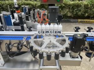 Aplicador de etiquetas de vial pequeño automático de Venta caliente para máquina de etiquetado de botellas redondas - Product Image 4