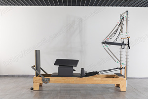 เครื่องพิลาทิสอเนกประสงค์ที่ทนทาน พร้อมเตียงเลื่อนและเตียงแกนกลางสีขาวแบบกึ่งยกสูง  พร้อมอุปกรณ์ทาวเวอร์รีฟอร์เมอร์ไม้ - Product Image 5