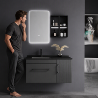 Meuble-lavabo de salle de bain moderne noir mat flottant à cannelures avec miroir rétroéclairé par LED, armoire latérale et porte cannelée, lavabo intégré
