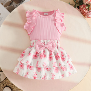 Set di Abbigliamento OEM ODM per Bambina con Top Senza Maniche in Pizzo Plissettato e Gonna a Doppio Strato con Fiocco - Product Image 1